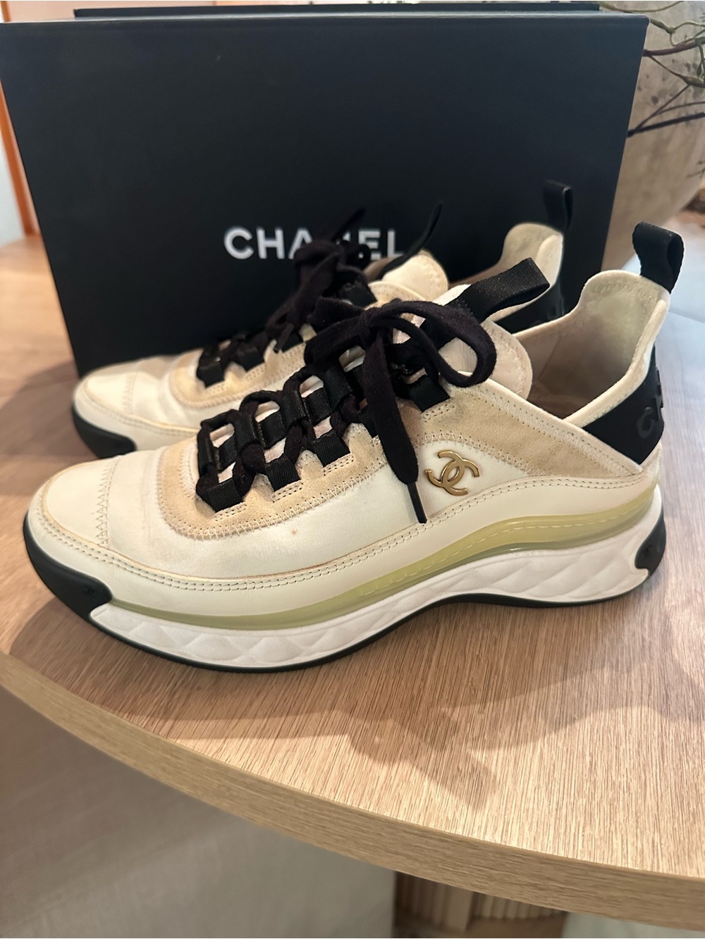 CHANEL Cream and Black Men's Low-Top Sneaker with Gold CC Emblem